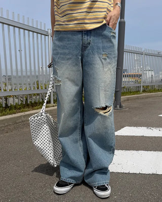 Distressed wide-fit denim pants