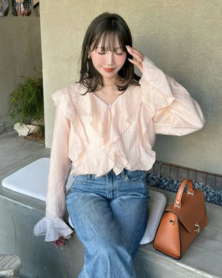 Ruffled V-neck blouse