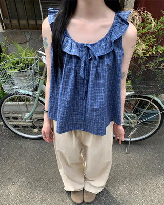 Checked ruffle sleeveless blouse