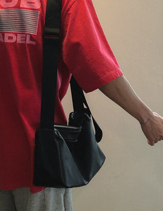 Mini clip leather crossbody bag