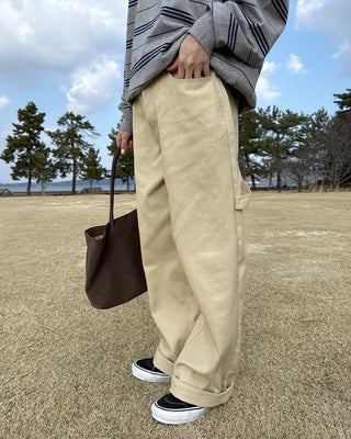 Cotton pants with side buckle patches