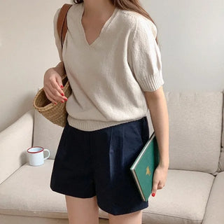Minimal whole garment V-neck knit