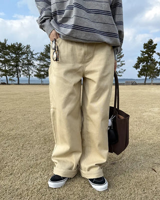 Cotton pants with side buckle patches