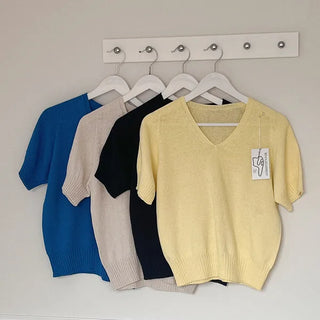 Minimal whole garment V-neck knit