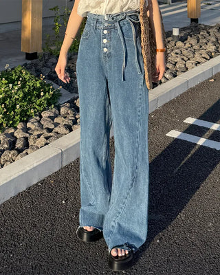 High-waisted denim pants with button strings