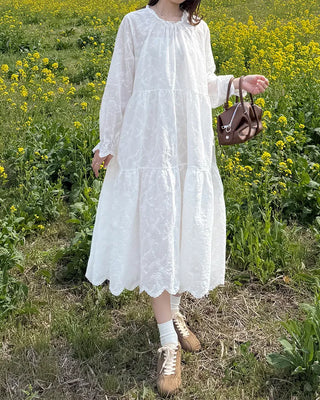 Long dress with neck lace detail and ruffles