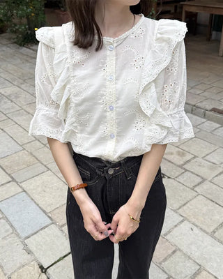 Punched ruffle blouse