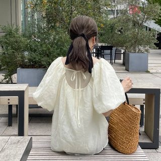 Ribbon-point rattan handbag