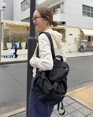 Square pocket nylon backpack