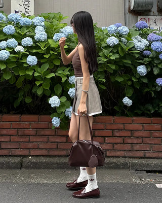 Basic sleeveless top with cap