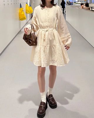 Shirred dress with strings