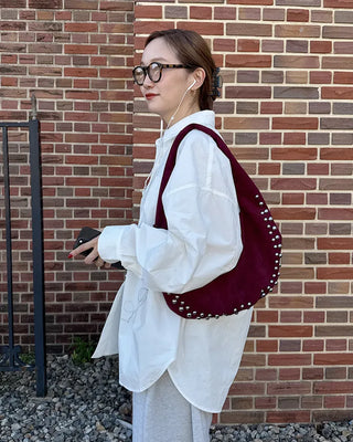 Studded suede shoulder bag