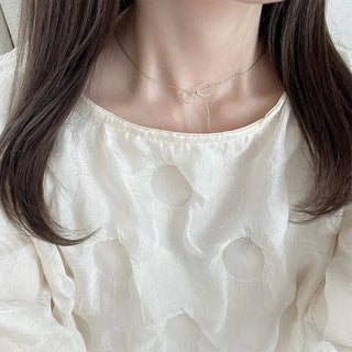 Ribbon motif necklace