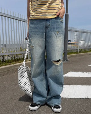 Distressed wide-fit denim pants