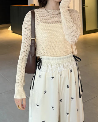 Loose-fitting perforated knit