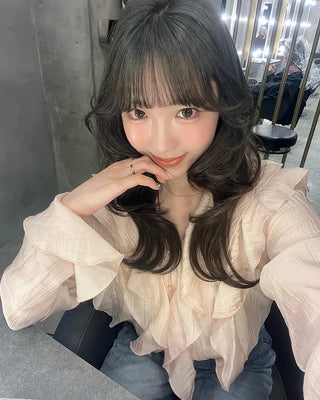 Ruffled V-neck blouse