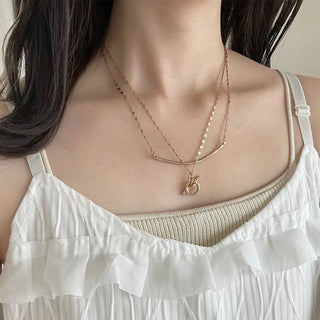 Round motif toggle clasp necklace