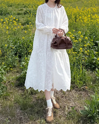 Long dress with neck lace detail and ruffles