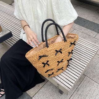 Ribbon-point rattan handbag