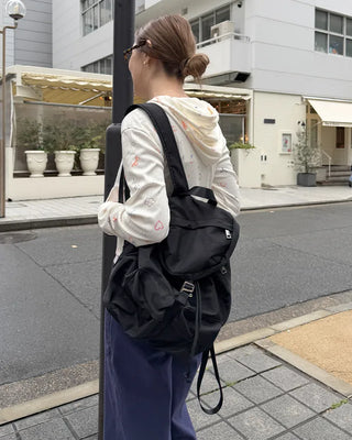 Square pocket nylon backpack