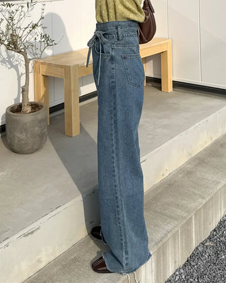 Strap high-waisted denim pants