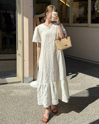 Long dress with ruffled hem