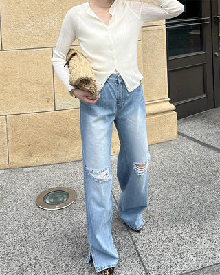 Distressed wide-fit denim pants