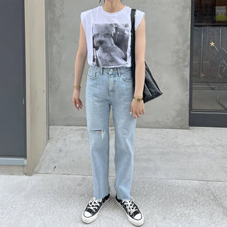 Distressed denim pants