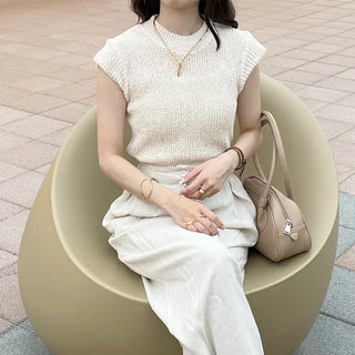 Sleeveless mock neck knit