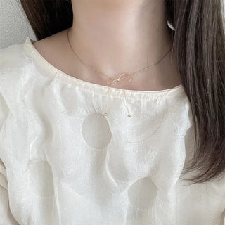 Ribbon motif necklace