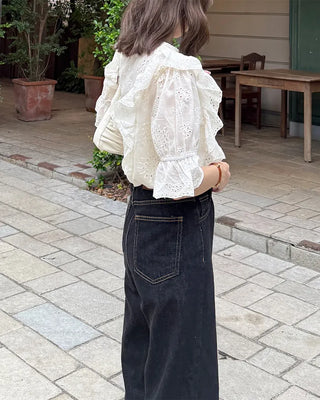 Punched ruffle blouse