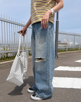 Distressed wide-fit denim pants