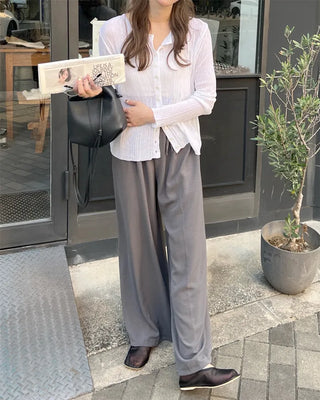 Two-button strap slacks
