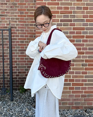 Studded suede shoulder bag