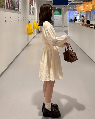 Shirred dress with strings
