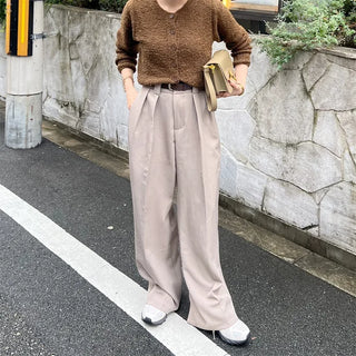 Belted pleated slacks