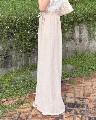 Two-button strap slacks