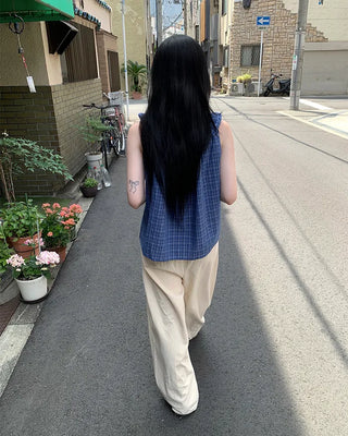 Checked ruffle sleeveless blouse