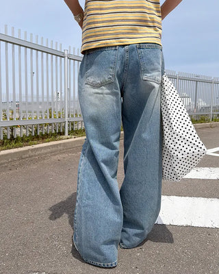 Distressed wide-fit denim pants