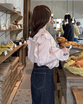 Ruffled V-neck blouse
