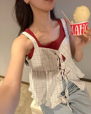 Checked ribbon sleeveless blouse