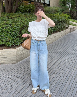 Side-point tapered denim pants