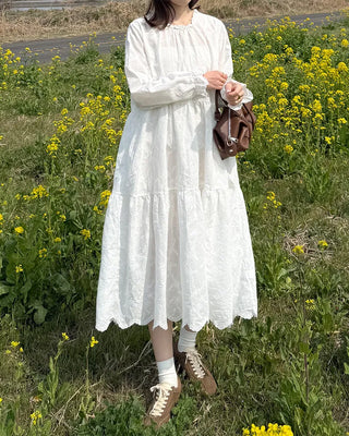 Long dress with neck lace detail and ruffles