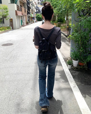 Low-waist point-washed flare jeans