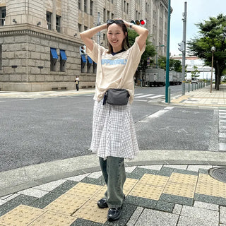 Pleated check midi skirt