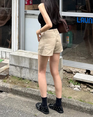 Basic sleeveless top with cap