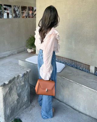 Ruffled V-neck blouse