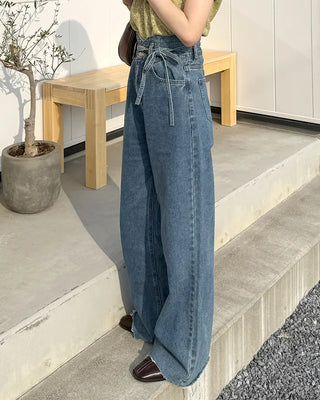Strap high-waisted denim pants