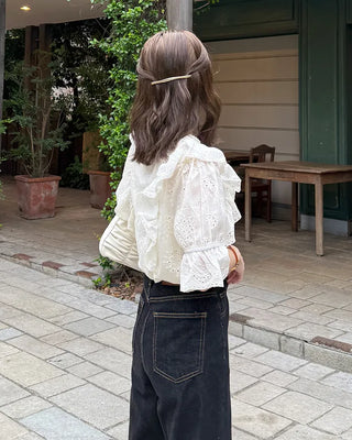Punched ruffle blouse