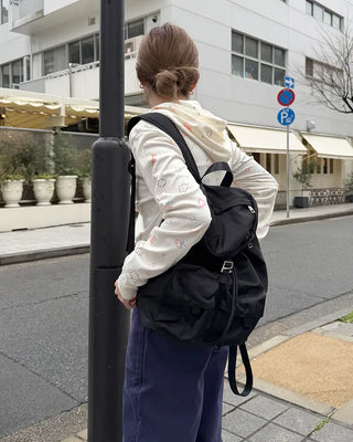 Square pocket nylon backpack